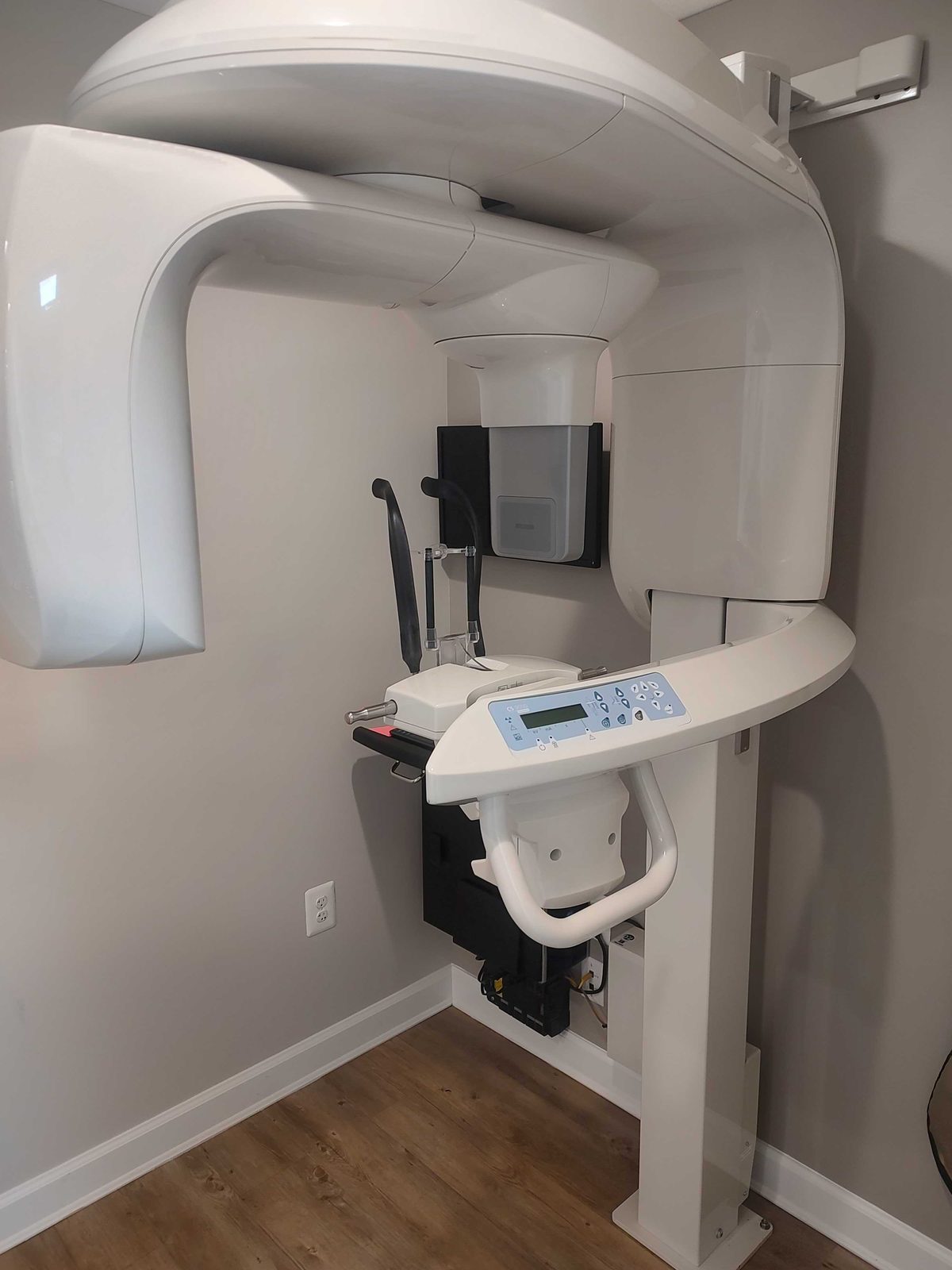 Panoramic dental X-ray unit in the imaging room at Elite Root Canal Specialties in Greenbelt, MD