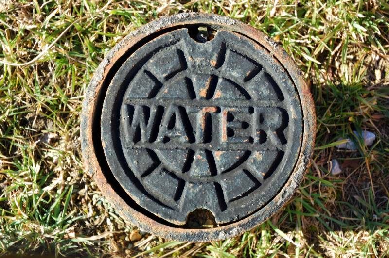 Water main cover on grass