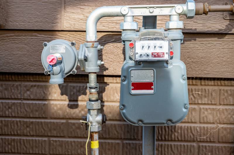 Residential gas meter and regulator.