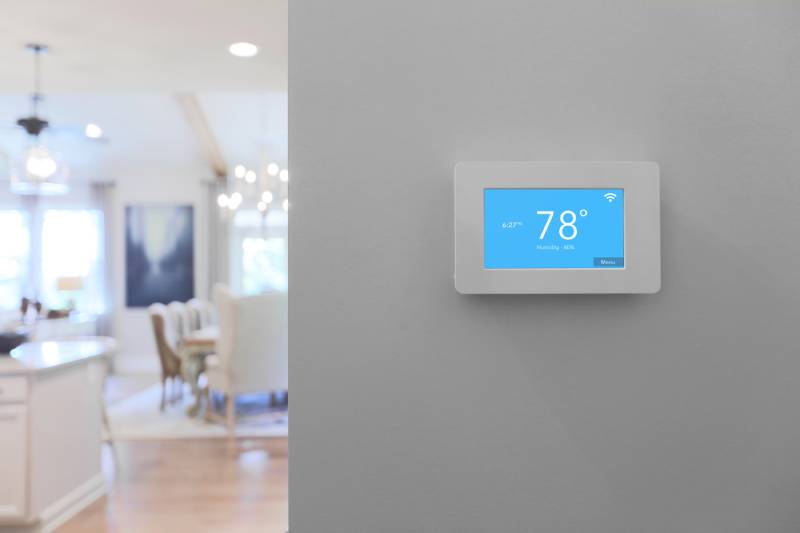 Smart thermostat displaying 78°F