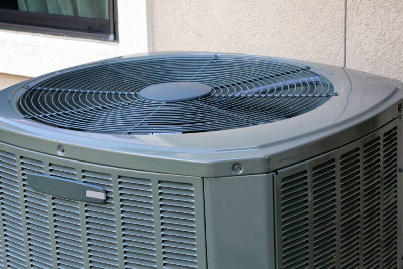 Central air conditioning unit outside a home.