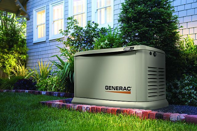 Generac generator beside house