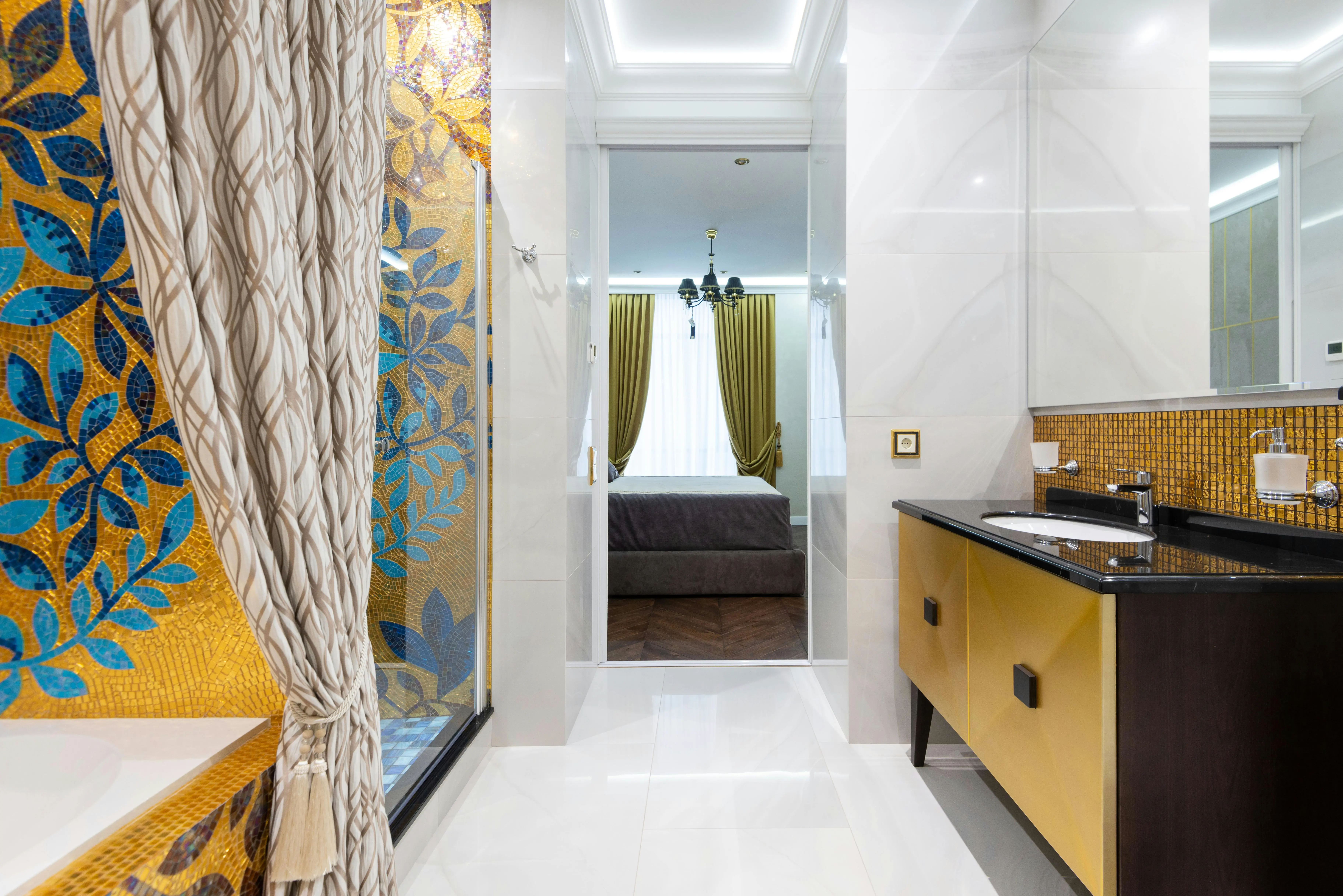 Bathroom with decorative shower curtain pulled to the side, highlighting how curtains and liners can collect mold and mildew if not cleaned regularly.