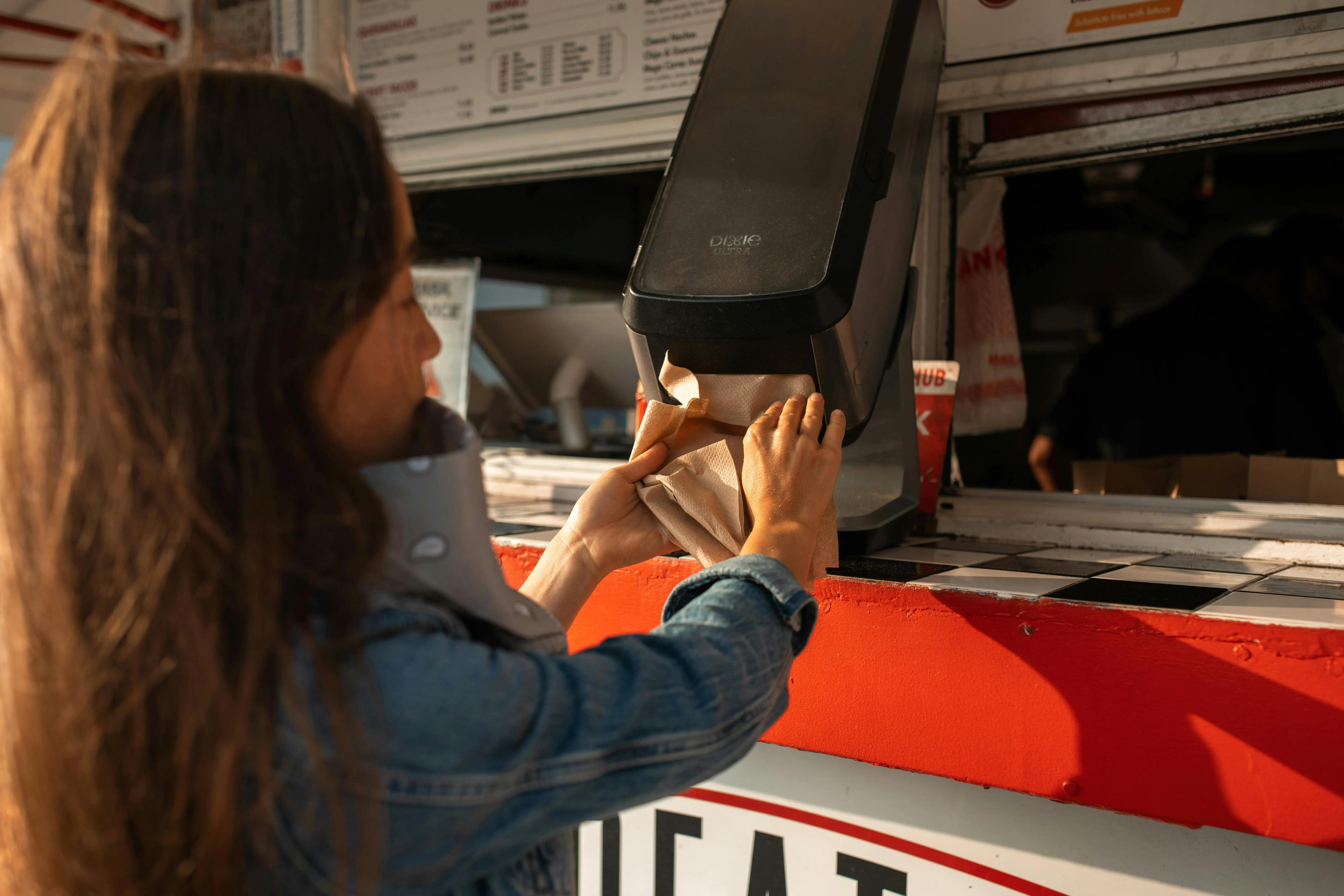  Worker in a Markham office emptying trash bins, a daily cleaning habit that keeps the workplace professional and hygienic.