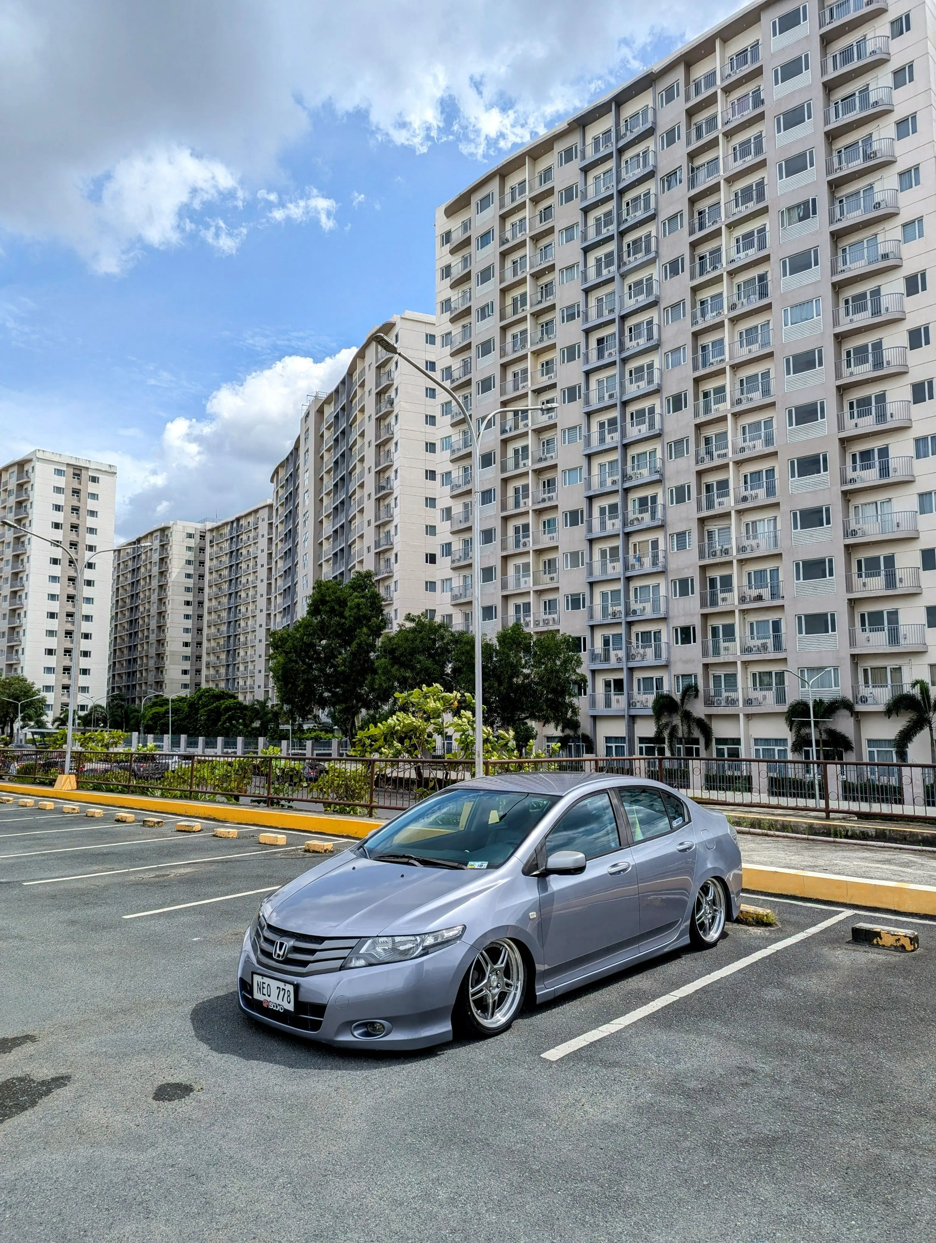 Visitor parking outside a condo building for your cleaner