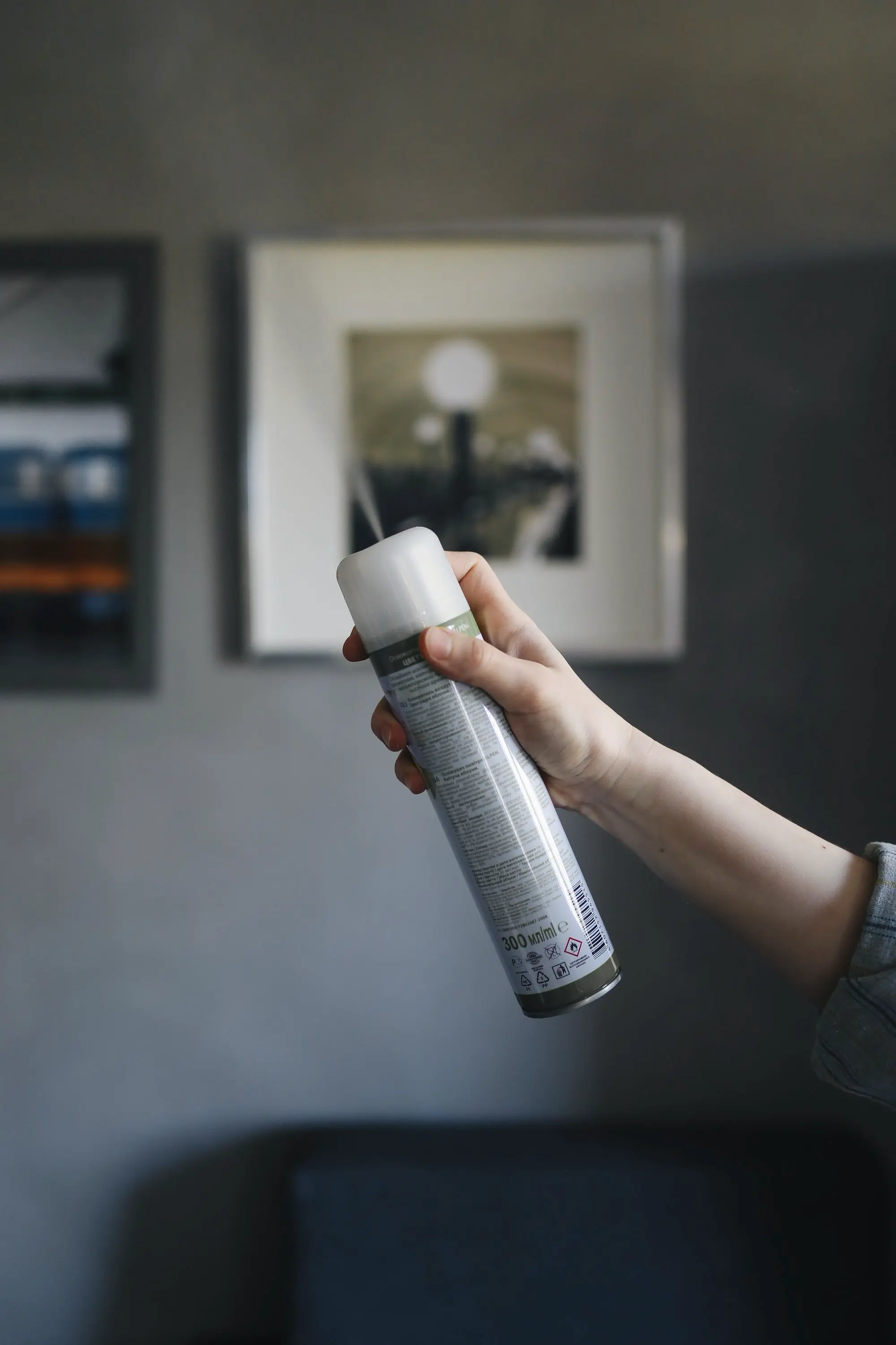 Spraying air freshener that masks rather than removes home odors