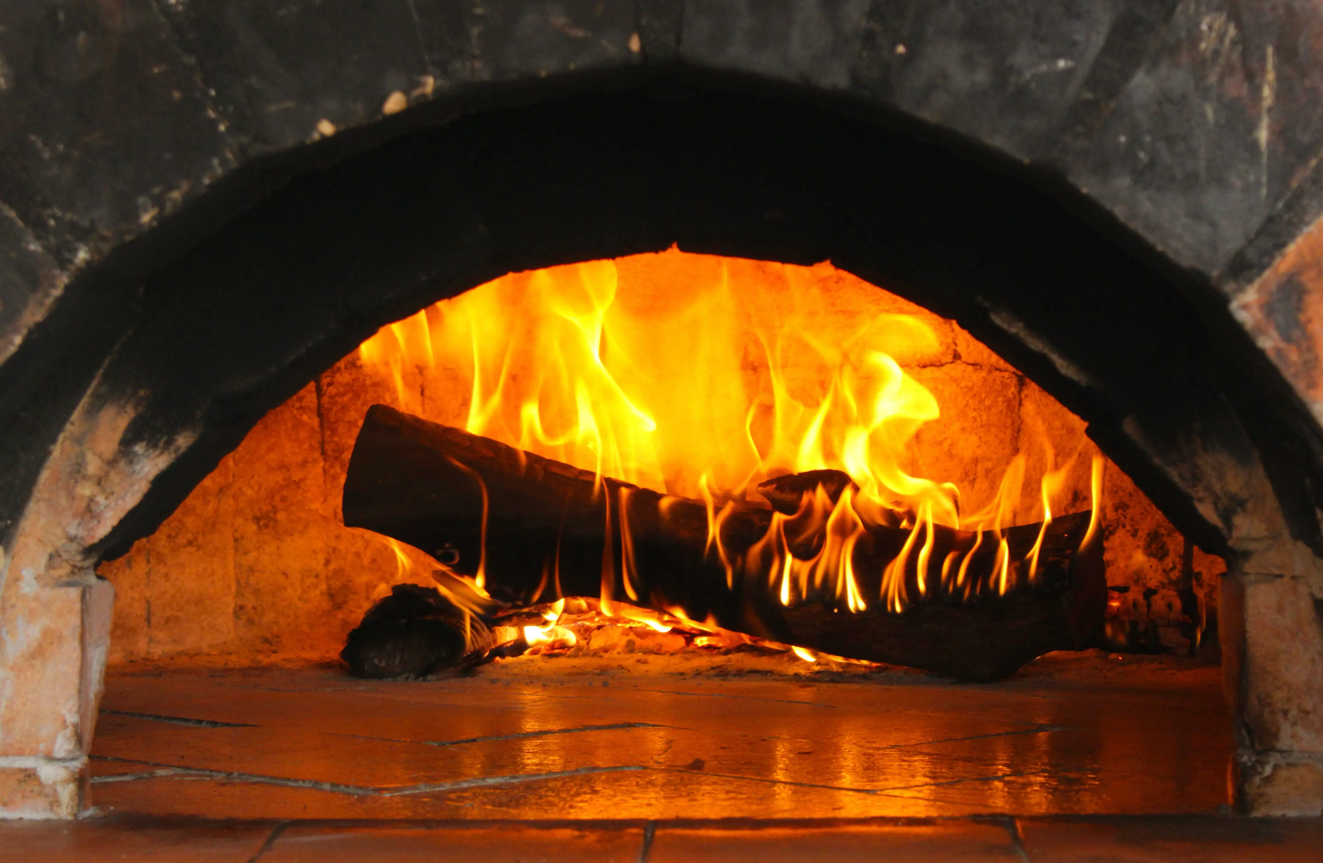 Fire burning in a brick hearth as the heating season begins in Toronto
