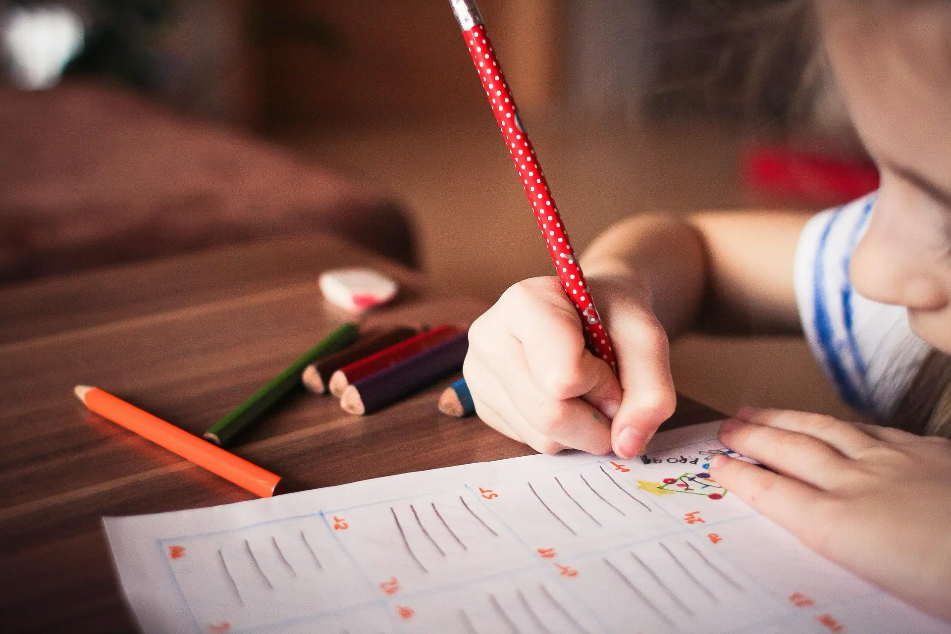 Child doing homework at a desk instead of the kitchen table