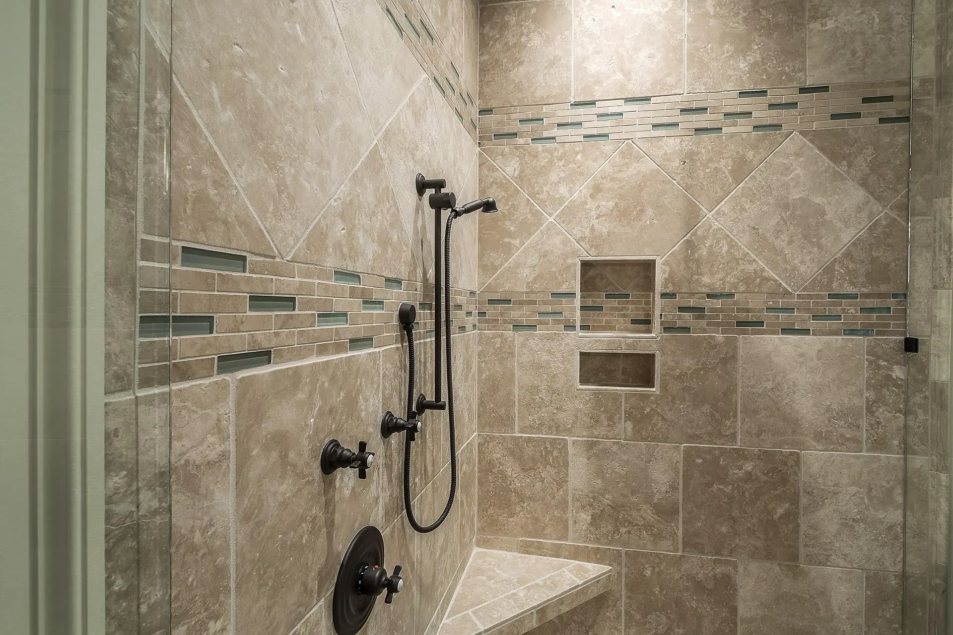 Newly tiled shower after a bathroom renovation and post renovation clean
