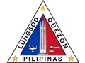 Seal of Quezon City featuring a shield with a red tower, green hills, and a blue wave, encircled by the text 'Lungsod Quezon Pilipinas' and topped with a yellow star.