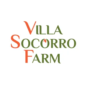 Villa Socorro Farm logo with stylized orange and green text, including a leaf design inside the letter O.