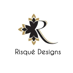 Logo for Risqué Designs featuring a stylized black and gold floral motif integrated with a cursive letter R.