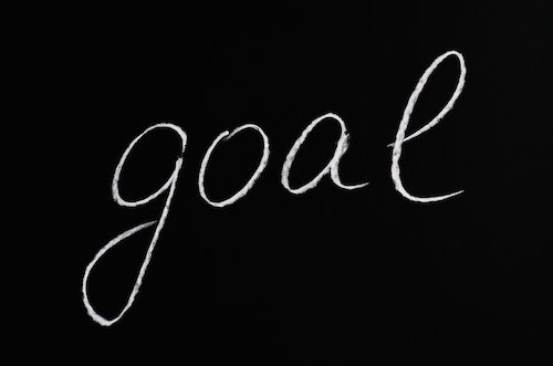 Image with black background with the word Goal and the text What Wagefit gives Employees