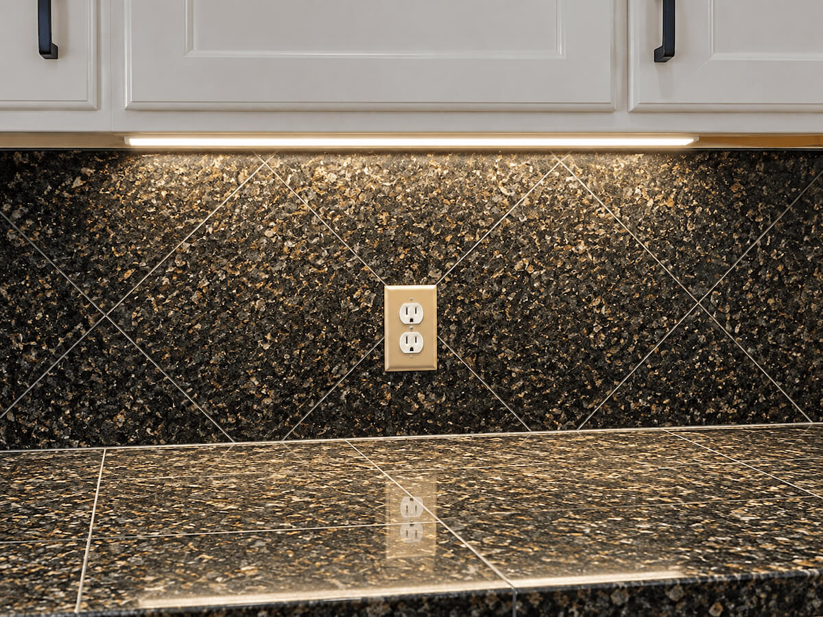 Integrated Electric under cabinet lighting installation
