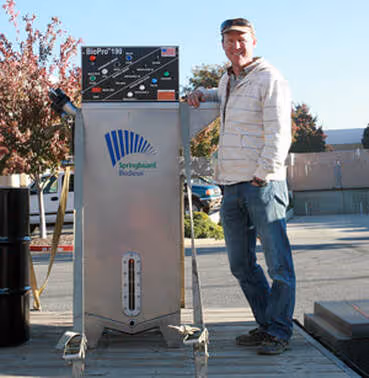 Greg Massa of Massa Farms with his BioPro 190 biodiesel processors