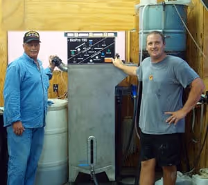 man next to biodiesel equipment