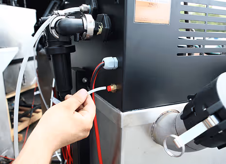 Step 5 to install pressurized water kit: reconnect screws and close back lid