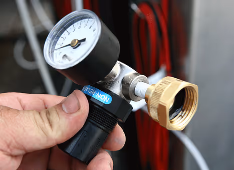 Step 7 to install pressurized water kit: locate water pressure fitting