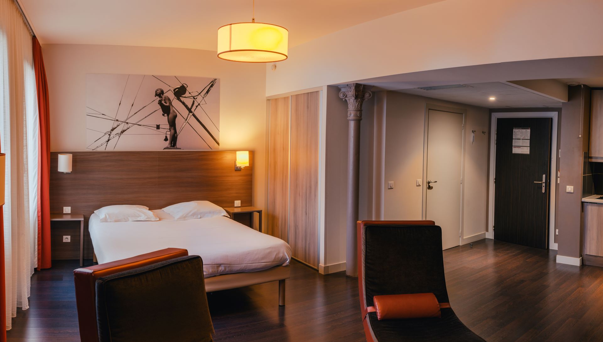 Chambre et lit Le City Lofthotel 3 étoiles Saint-Etienne