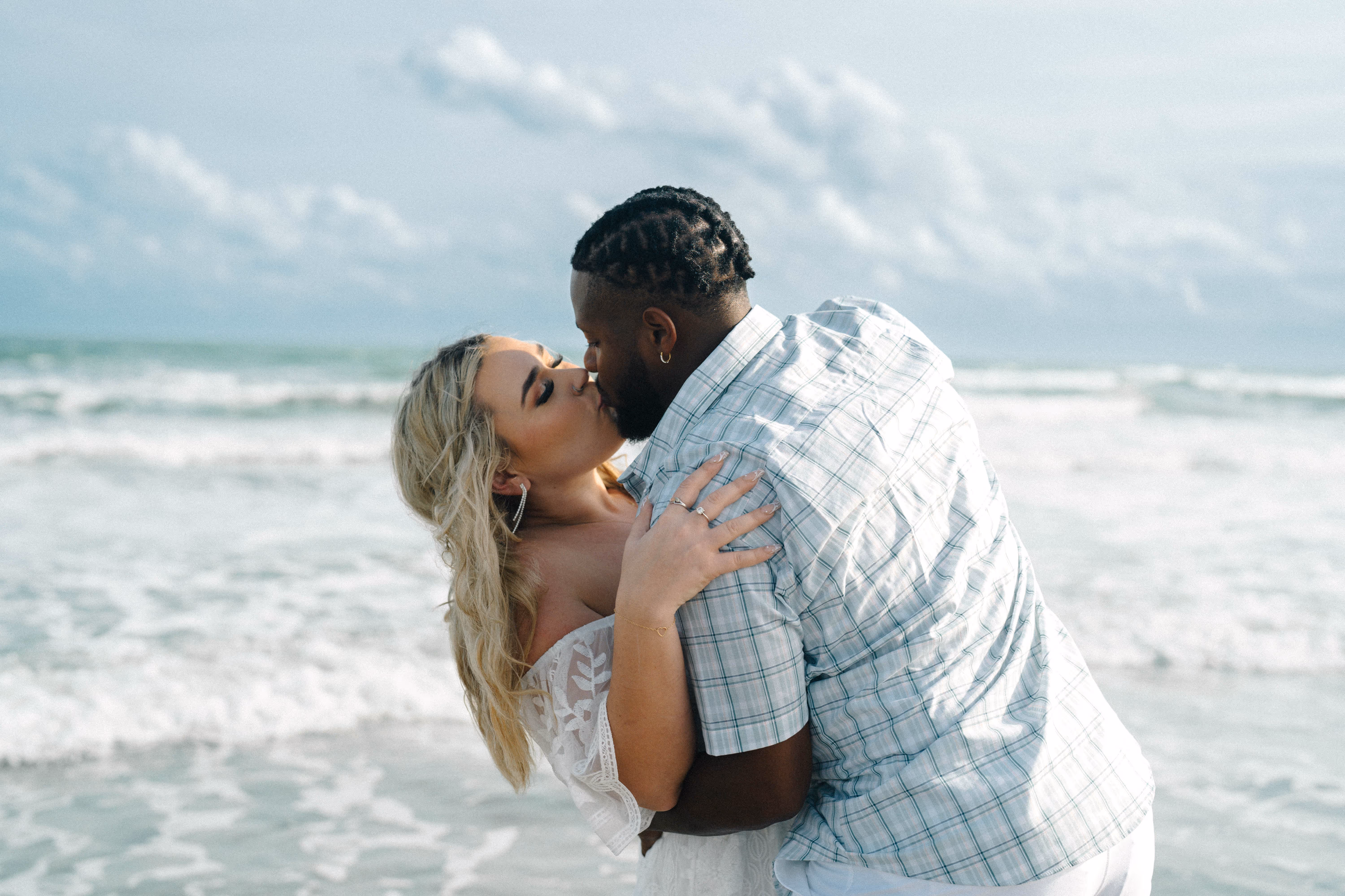 A couple kisses passionately at the Corpus Christi Beach Photography