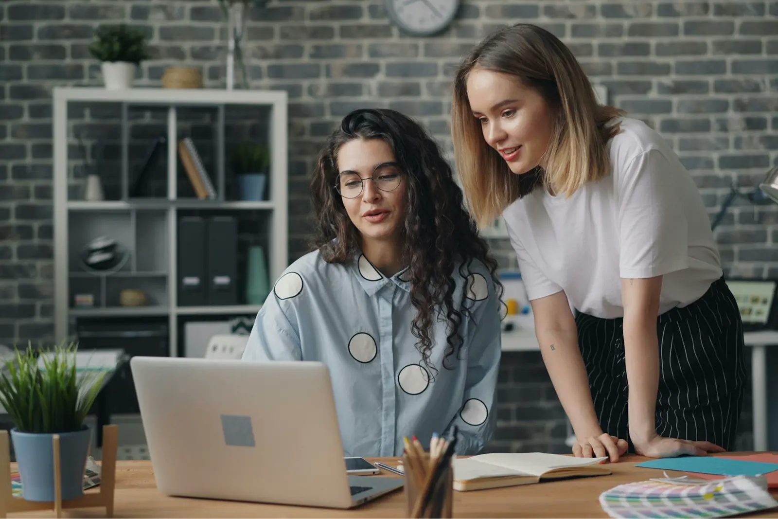 Colleagues working in office
