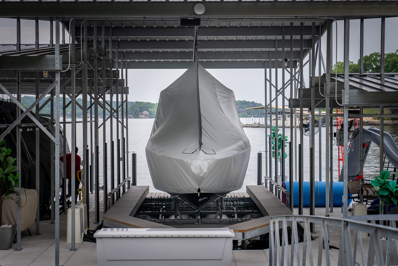 Marine Concepts custom cover installed on a boat at the dock