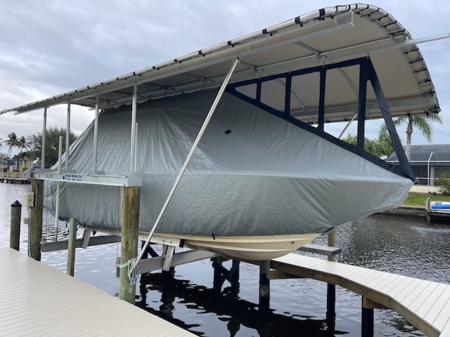 Gray Marine Concepts cover mounted under an existing boat lift canopy