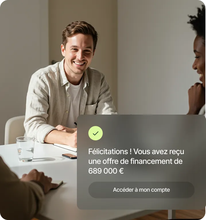 Smiling man sitting at a table during a meeting with two others, with an overlaid message in French about receiving a financing offer of 689,000 euros.