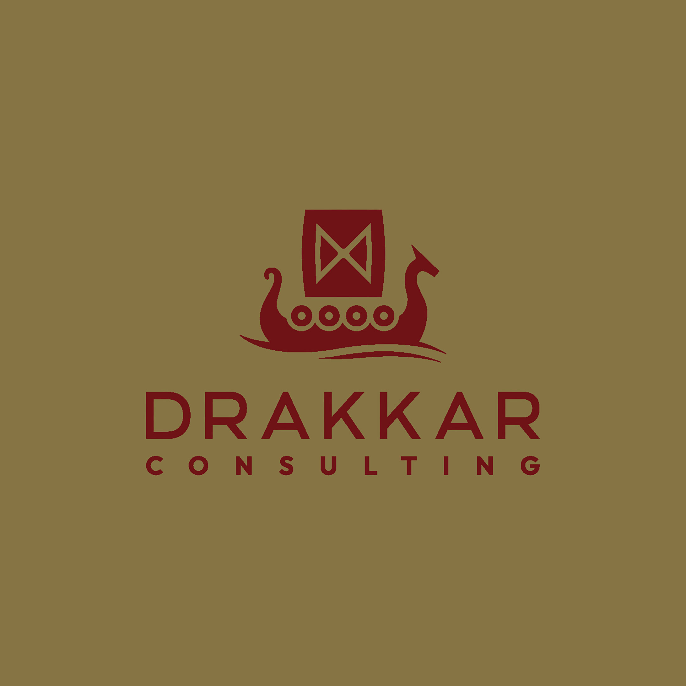 Maroon coloured Drakkar logo in the centre of a beautiful gold flat colour background.