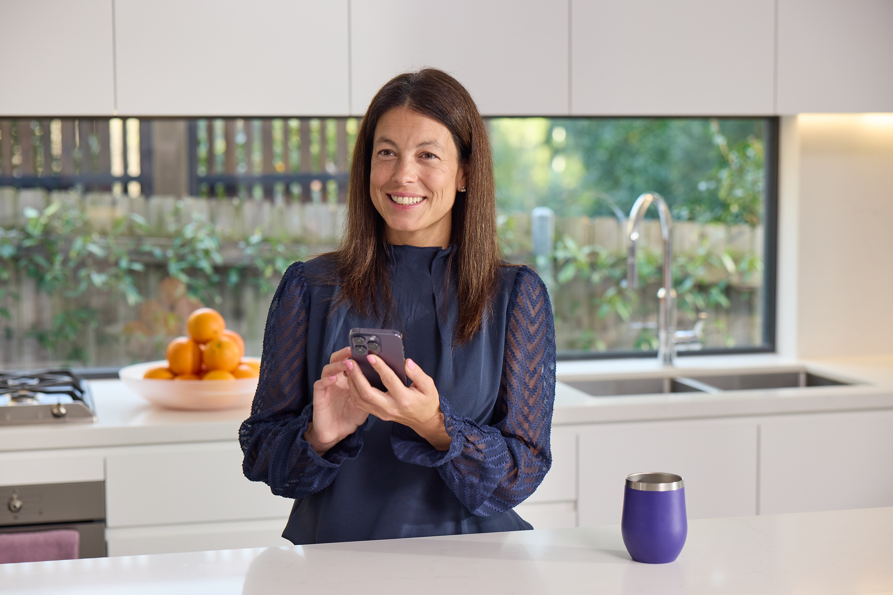 Person requesting a consult on their phone at home