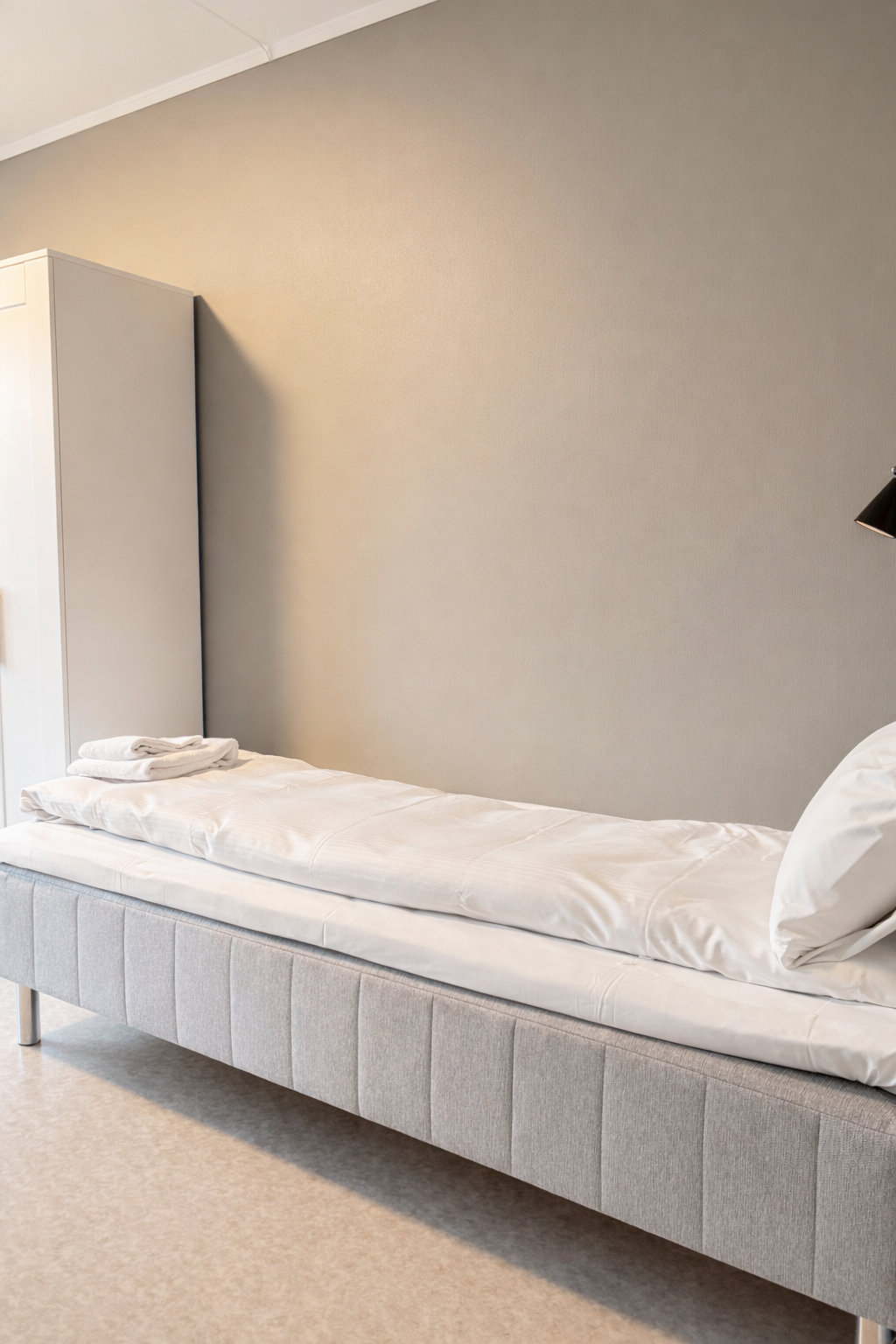 gray couch and white wooden table