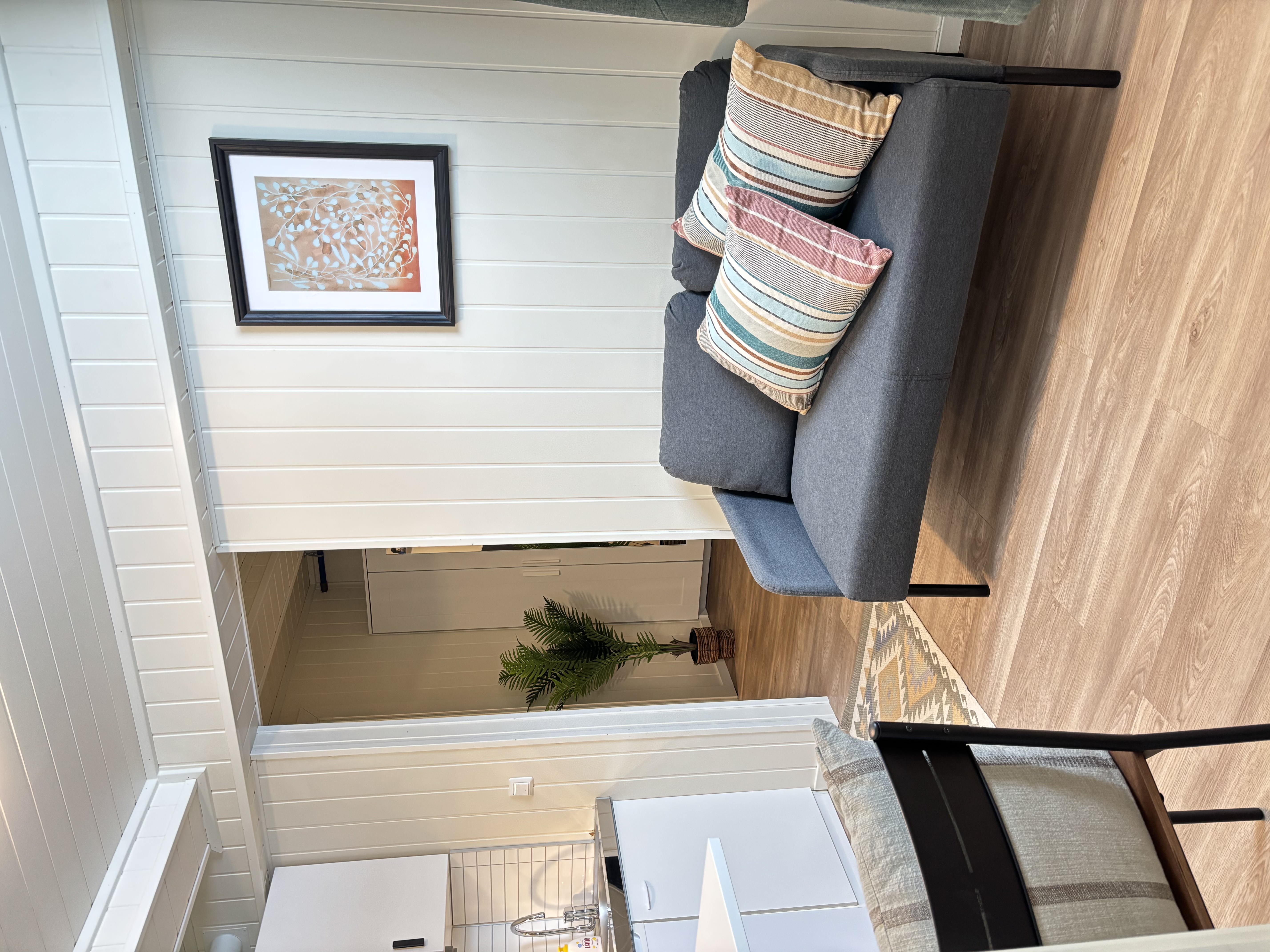 gray couch and white wooden table