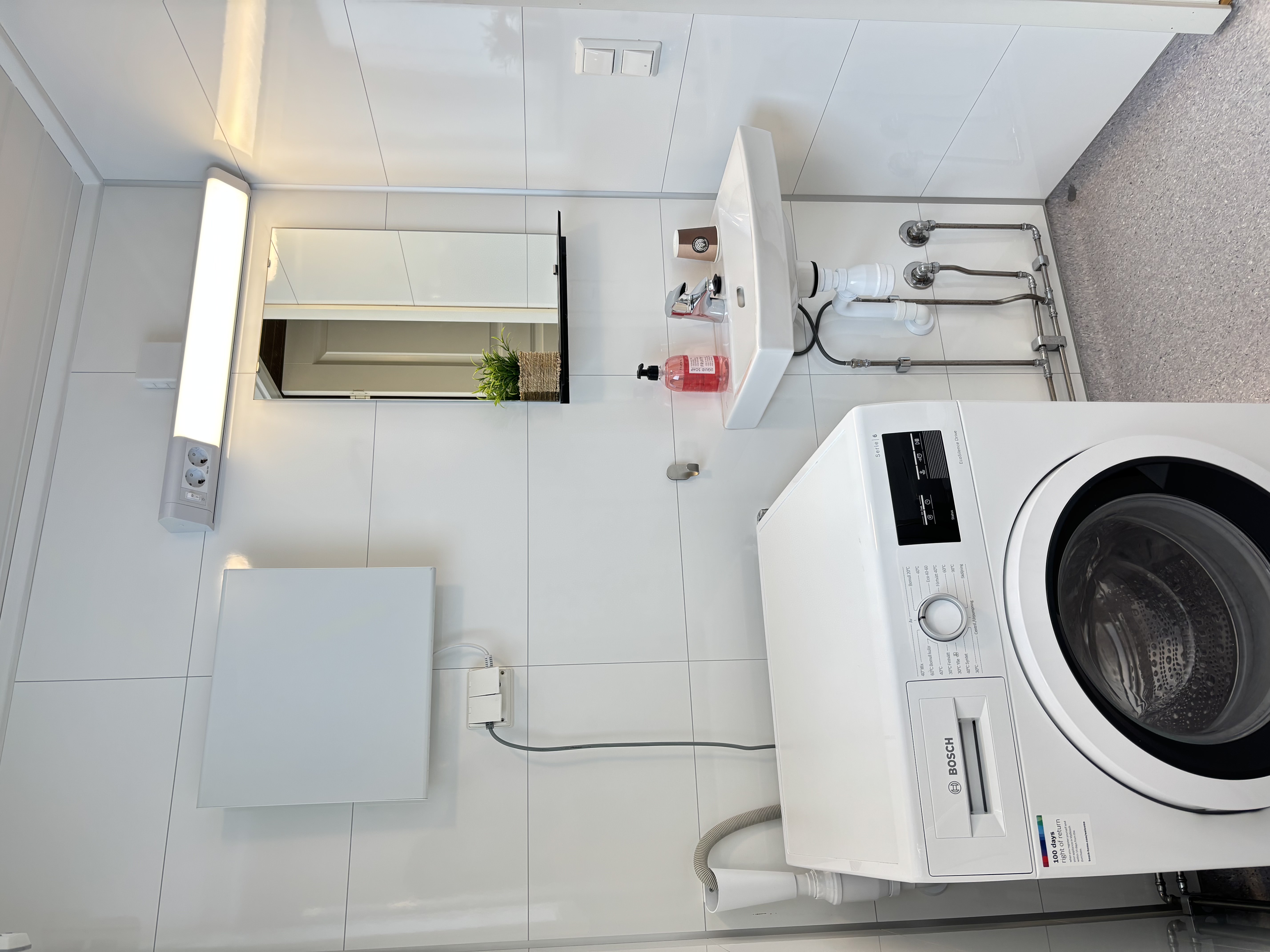 gray couch and white wooden table