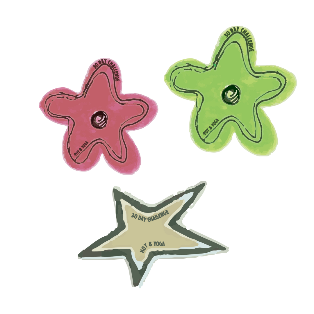 Three star-shaped stickers for 30 day yoga challenge in pink, green, and tan