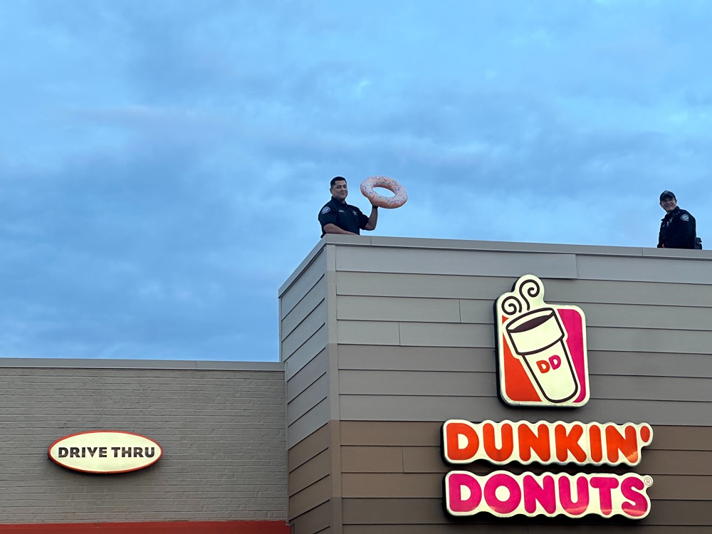 Dunkin' Cop on a Rooftop