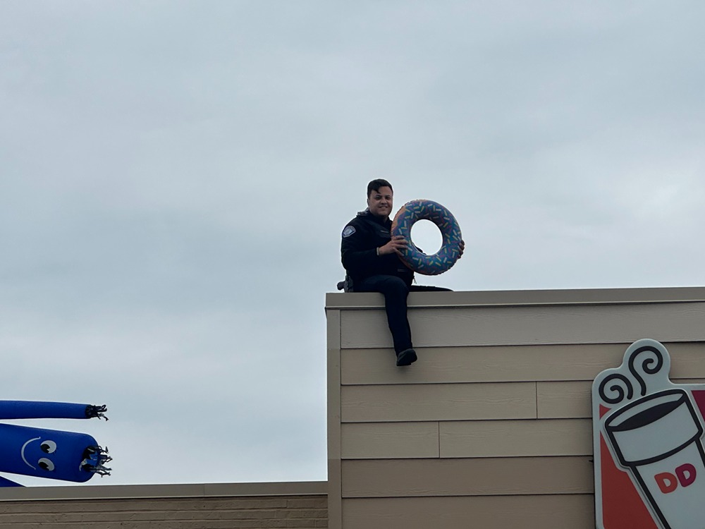 Dunkin' Cop on a Rooftop