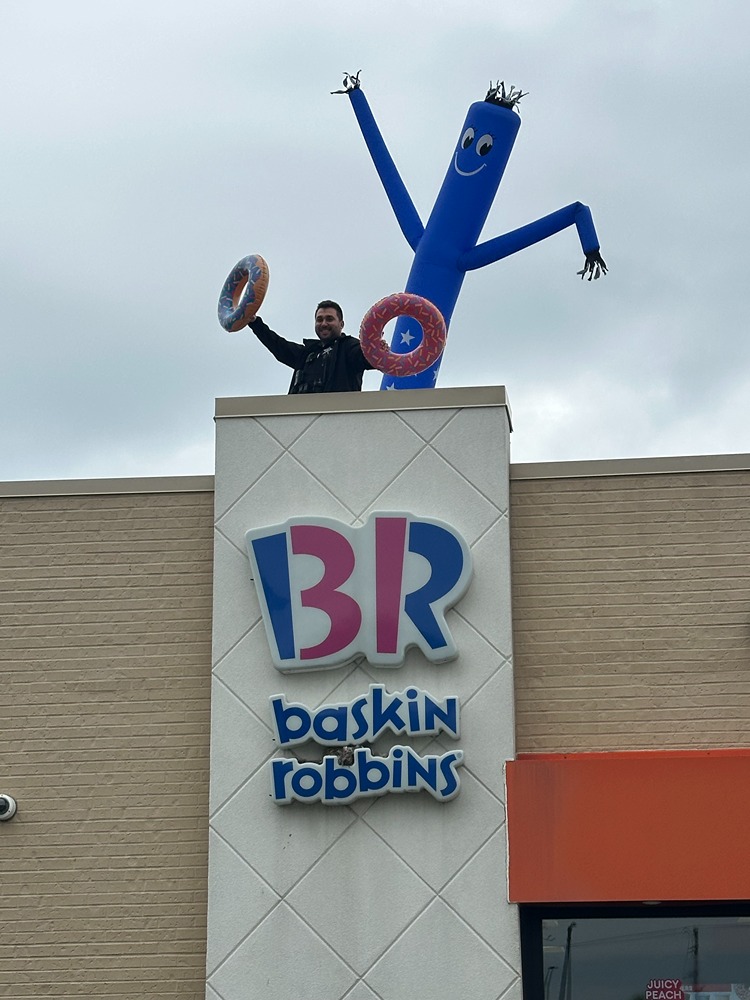 Dunkin' Cop on a Rooftop