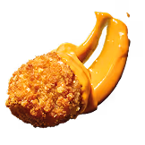 Een gefrituurde bal met een sausje.