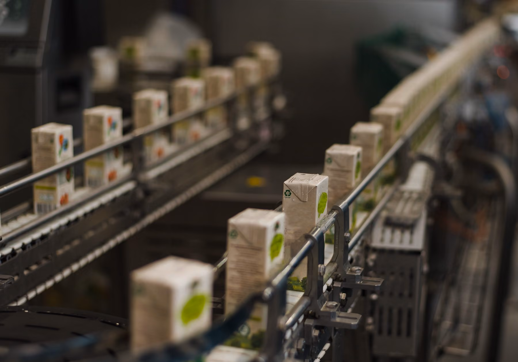 Packaged product moving along a factory production line