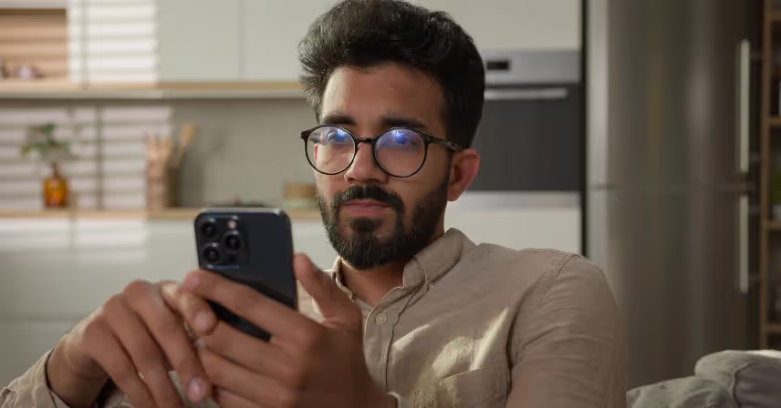 a man holding a mobile phone