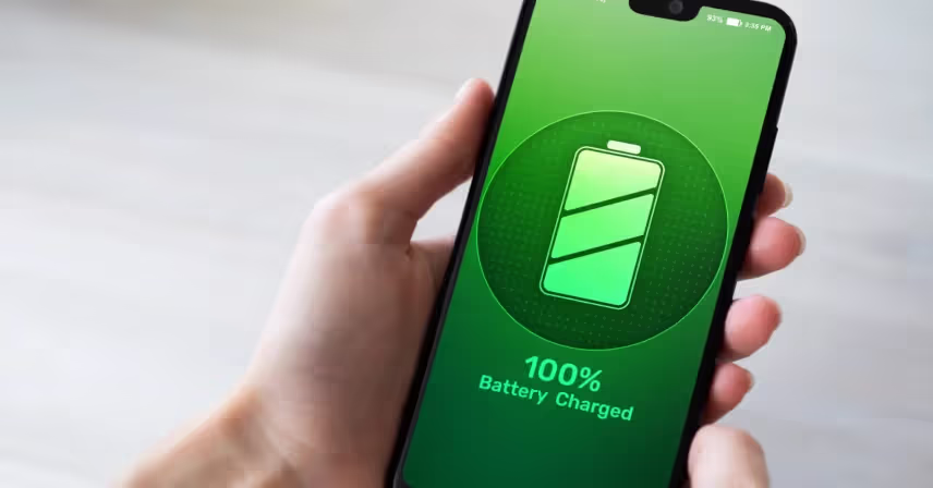 a hand holding a cell phone with a battery charged