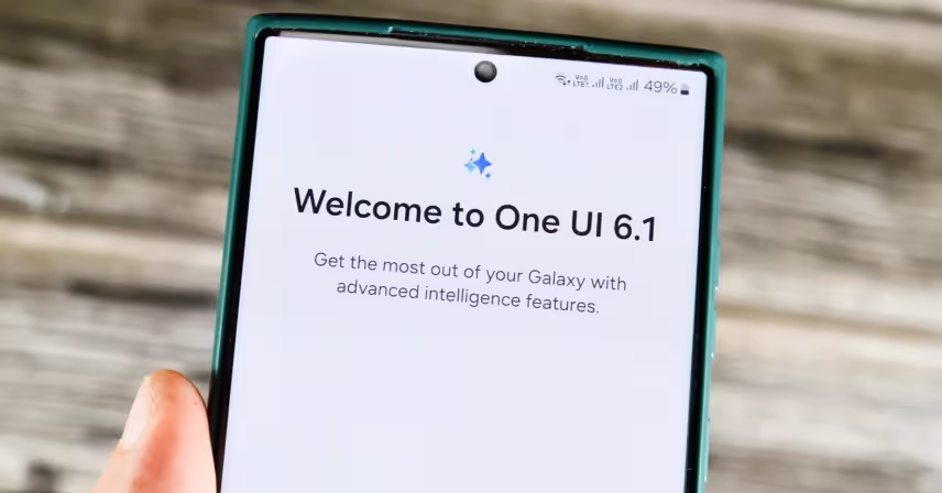 Close-up of a smartphone screen displaying a welcome message for One UI 6.1. The text reads, "Welcome to One UI 6.1. Get the most out of your Galaxy with advanced intelligence features."