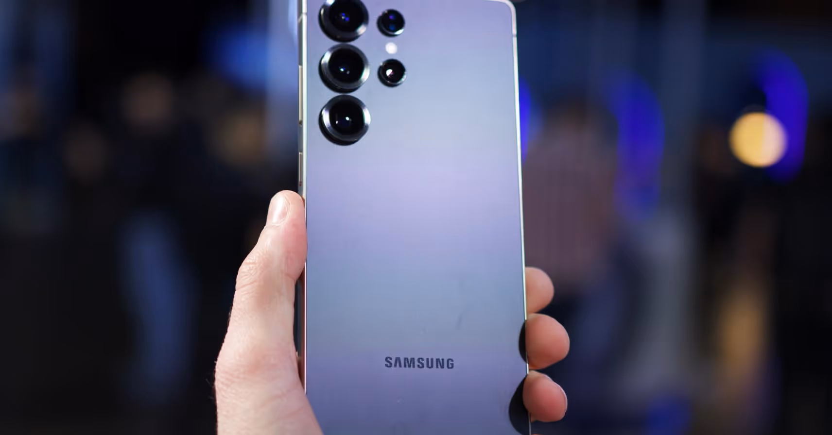 Hand holding the new Samsung Galaxy S25 Ultra at the Samsung Galaxy Unpacked event in 2025. 