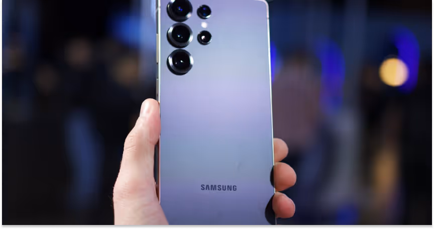 Hand holding the new Samsung Galaxy S25 Ultra at the Samsung Galaxy Unpacked event in 2025. 