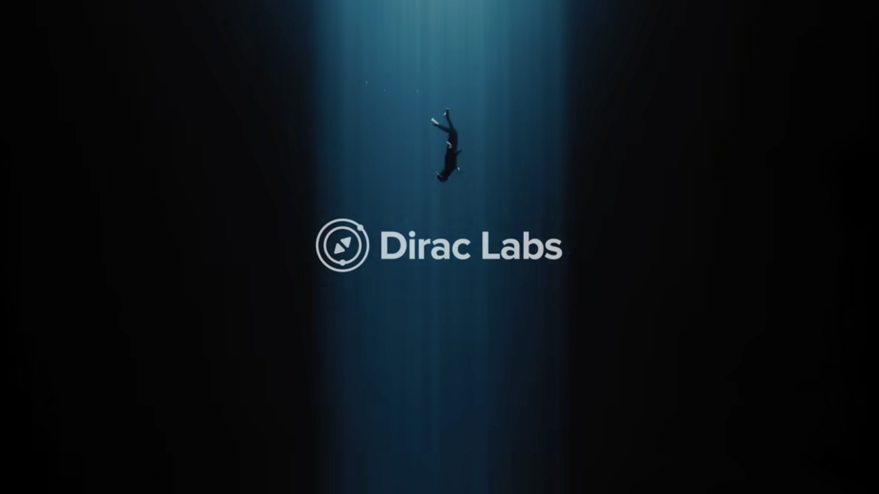 Diver descending through a shaft of light in dark water, with the Dirac Labs logo