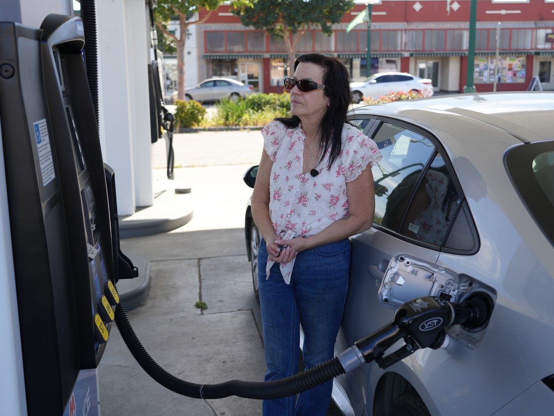Driver paying for gas at the pump