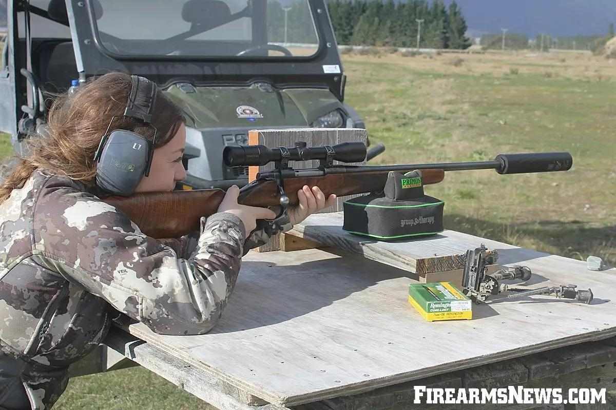 Caroline Boddington on with a rifle on a shooting bench in New Zealand.