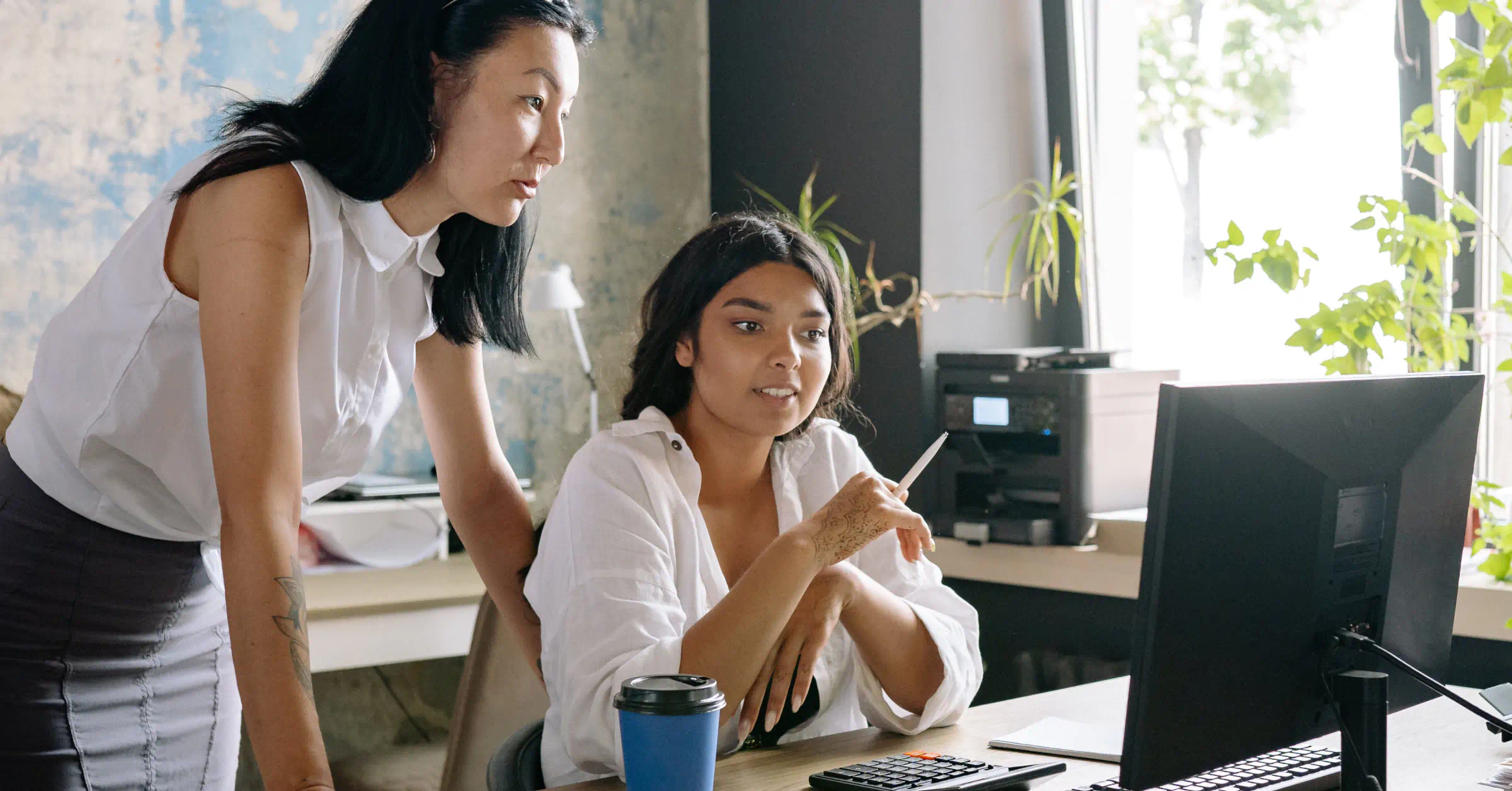 Workspace operations team engaged in discussion on a unified platform