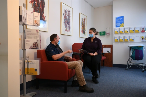 Image of patient and healthcare worker making a treatment plan