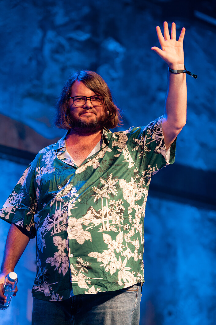 Kyle Roof presenting POP's SEO methodology on stage
